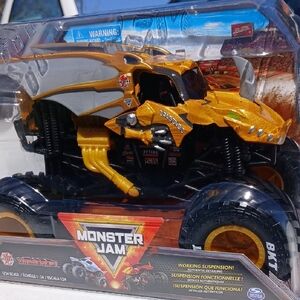 Dragonoid  Monster Jam Truck Toy - Gold and Black. 1/24